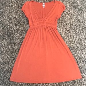 Super flattering orange dress!